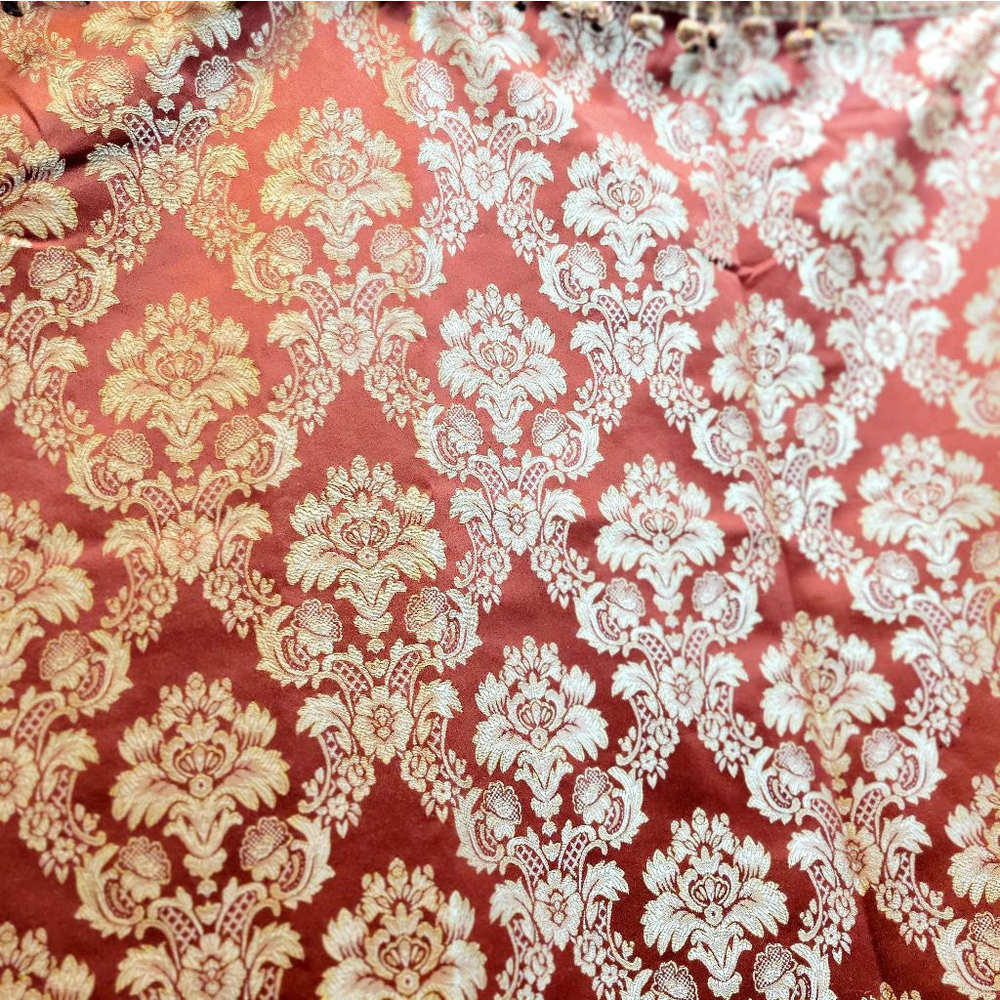 Ruby red and gold reversible embroidered and tassled table cloth